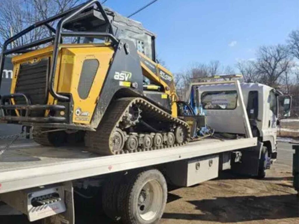 machinery towing skidsteer loader